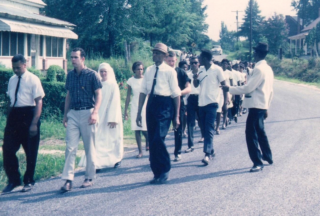 Marching to the courthouse, Crawfordsville GA. 1965. Photo Credit: https://www.crmvet.org/images/imgscope.htm